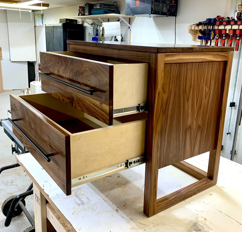 The walnut dresser with both drawers open