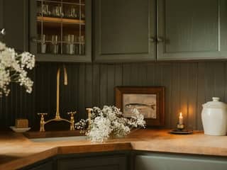 Beadboard wainscoting in deep green